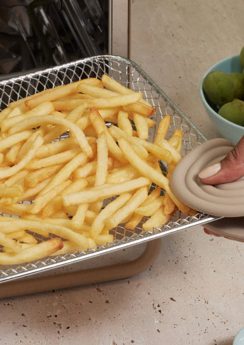 air frying fries in beige wonder oven