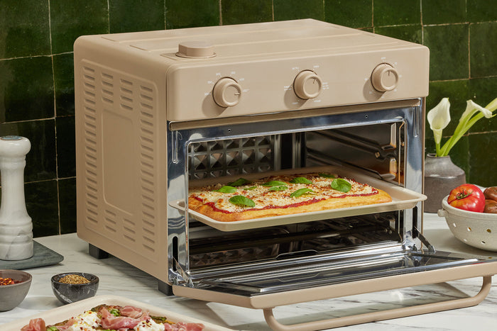 Beige Wonder Oven with pizza inside