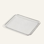 Metal mesh baking tray on a white background