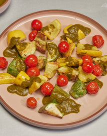 Roasted Summer Squash with Chimichurri on a pink plate