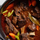 black perfect pot slow cook meat closeup