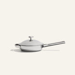 Titanium Always Pan Pro 20 cm (2.0) stainless steel skillet with a light gray lid, long handle, and non-toxic design.