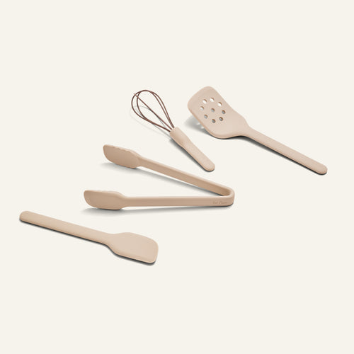 Mini Utensil Essentials: a set of four compact, sturdy silicone tools—spatula, tongs, slotted turner, and whisk—arranged on a light background.