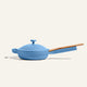 The Ceramic Nonstick Always Pan 20 cm, featuring a blue finish, a lid, and a wooden handle, is shown in profile against a light background.