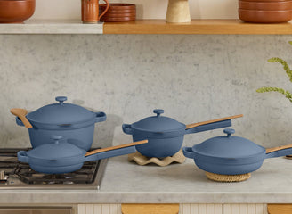 blue perfect pot, mini always pan, mini perfect pot and always pan on counter and stove